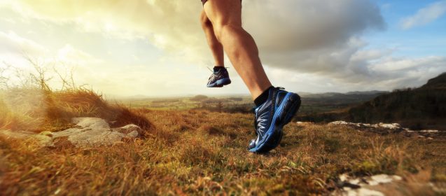 Outdoor cross-country running in early sunrise concept for exercising, fitness and healthy lifestyle